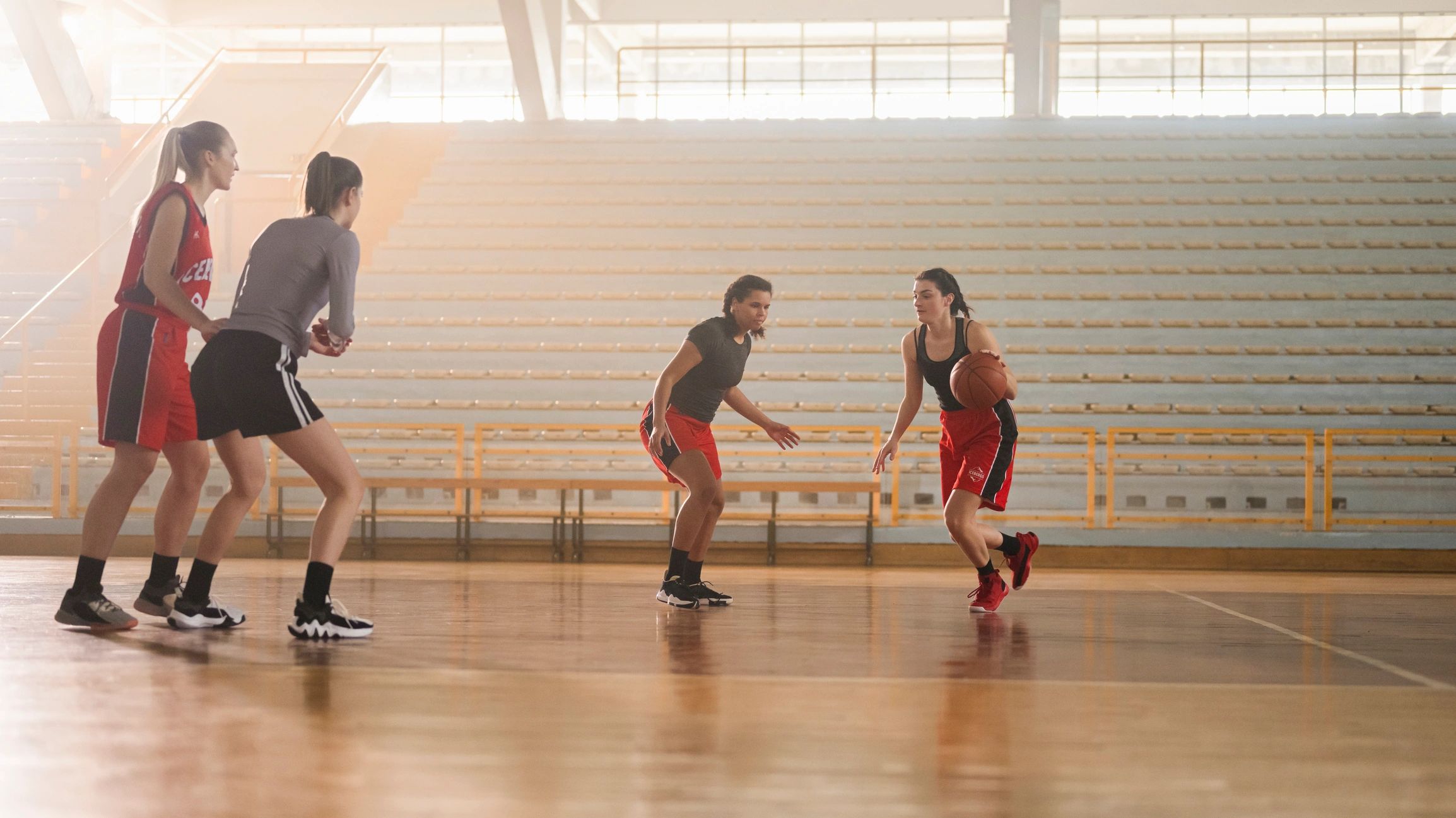 Basketball players practicing together on court