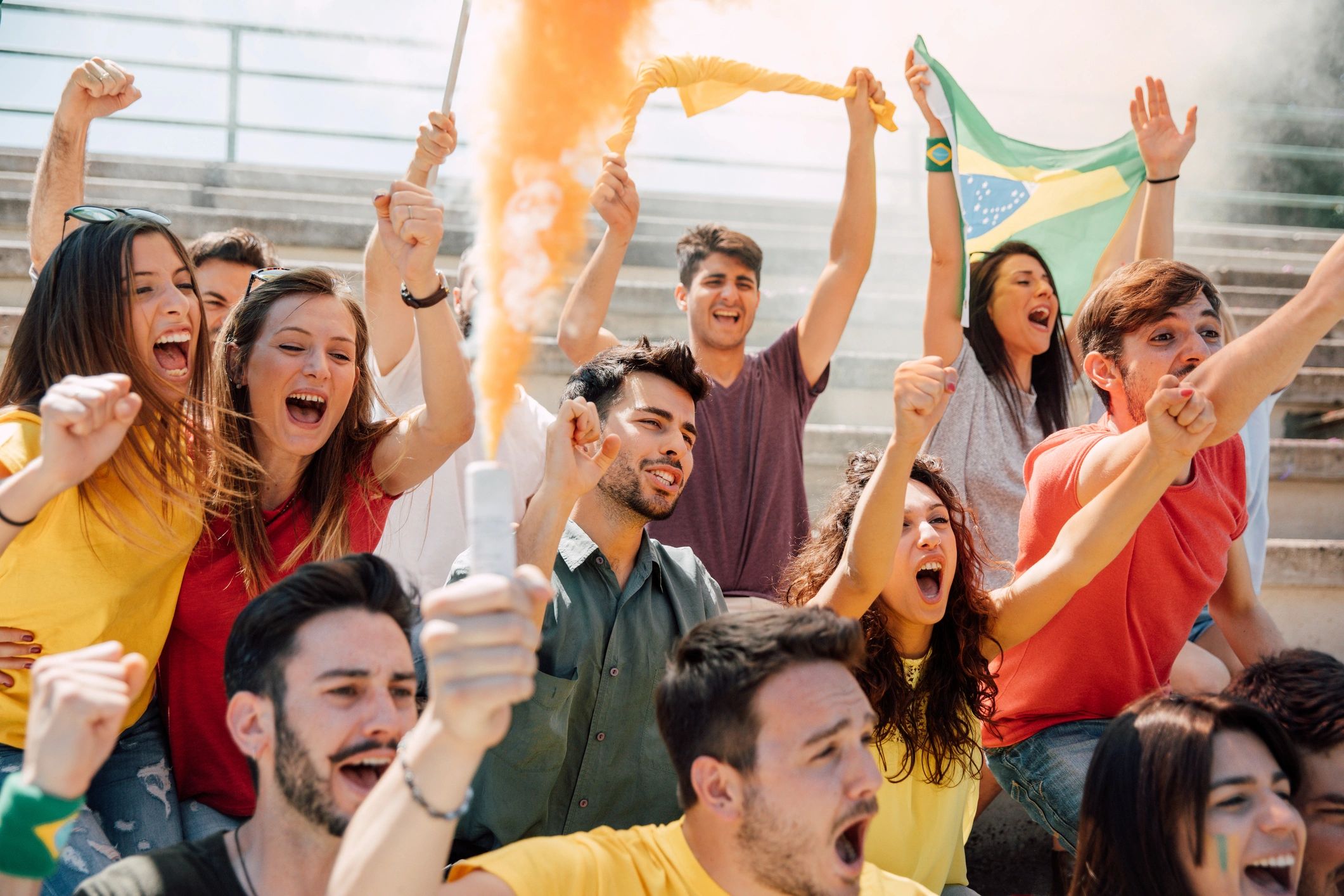 Excited sports crowd cheering at an event